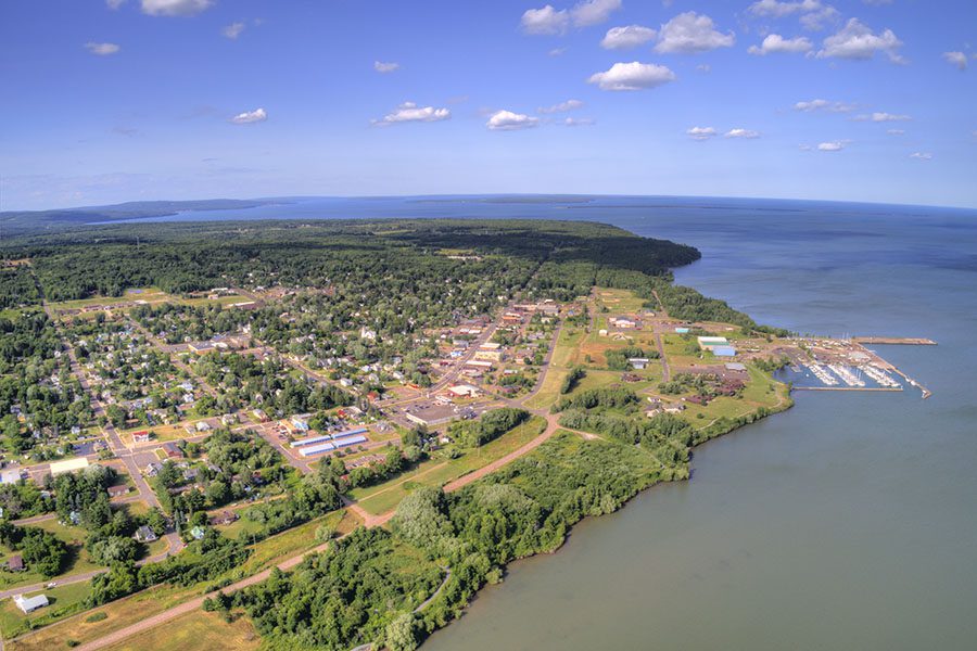 Pewaukee WI - Aerial View of the Town of Pewaukee in Wisconsin by the Lake on a Clear Sunny Day