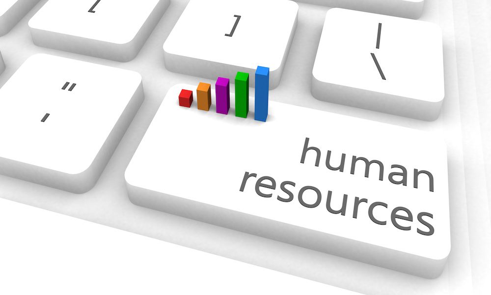 Keyboard with a key that says human resources that has miniature colorful bar graphs rising from it.