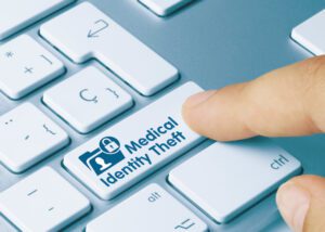 Medical Identity Theft key on keyboard where Shift key usually is written in bolded blue text.