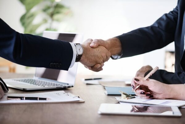 two businessmen shaking hands